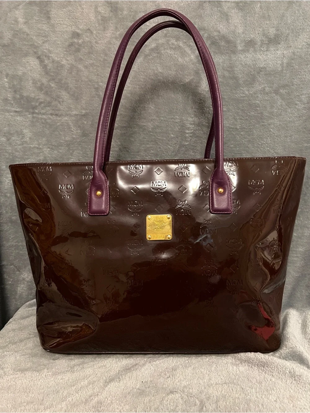MCM Patent Tote in Dark Brown with Plum Handles